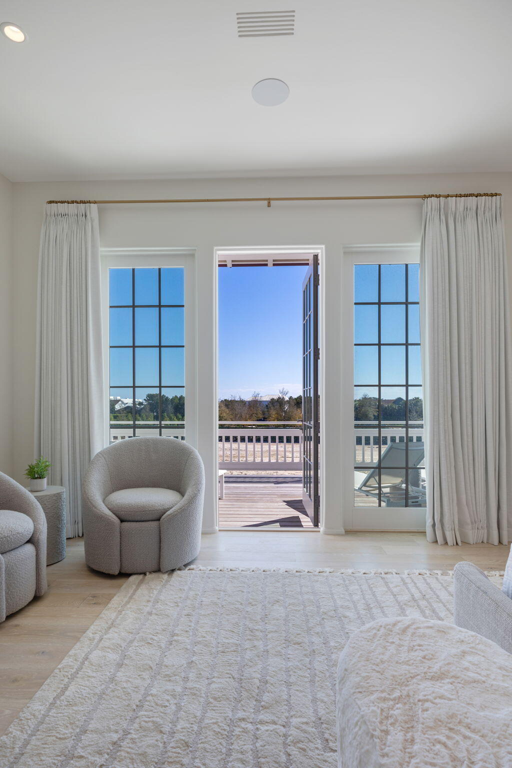 19 Astra Way Inlet Beach, Unit M12 Inlet Beach, FL 32461 - Photo 31 of 81 a living room with furniture and a large window