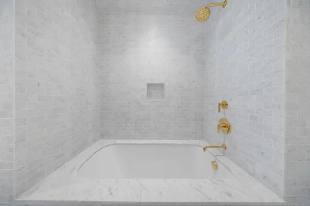 a view of a swimming pool with outdoor seating