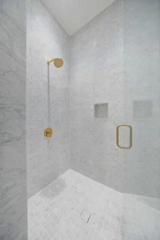 a view of swimming pool of a house with outdoor seating