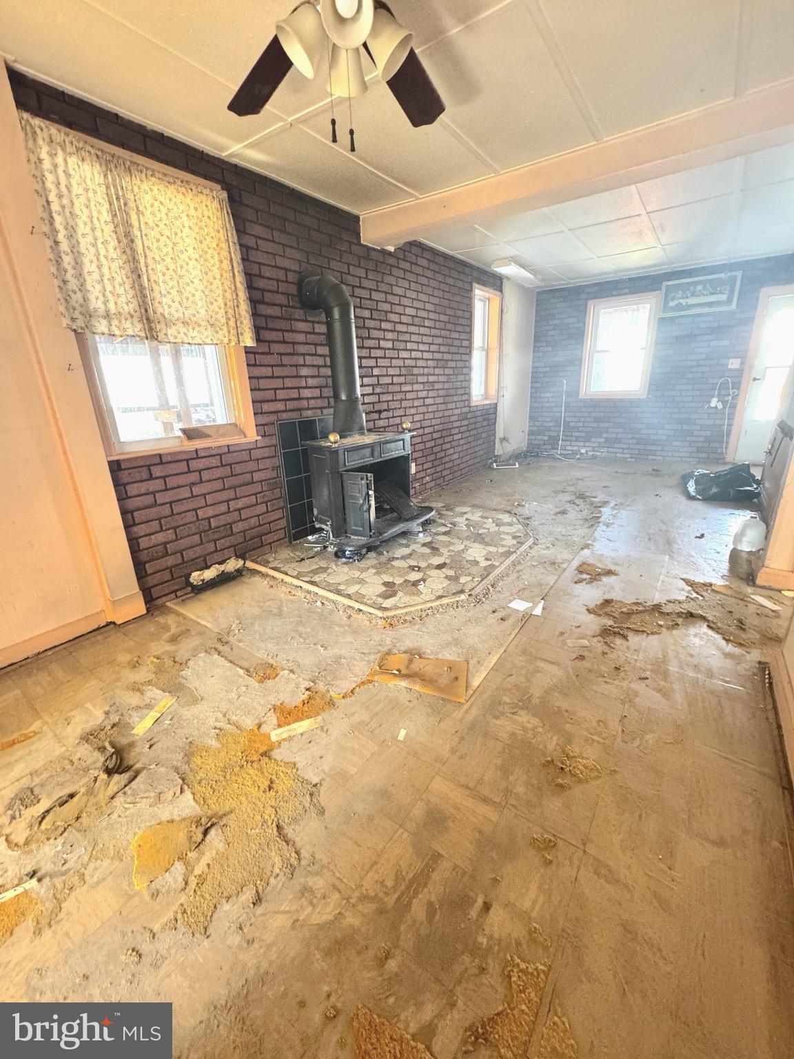 310 Pinewood Road Baltimore, MD 21222 - Photo 15 of 25 a view of an empty room with a window