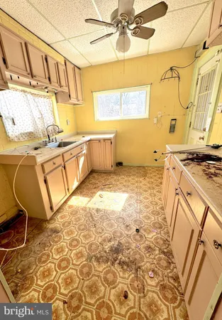 a bathroom with a sink a bathtub and shower