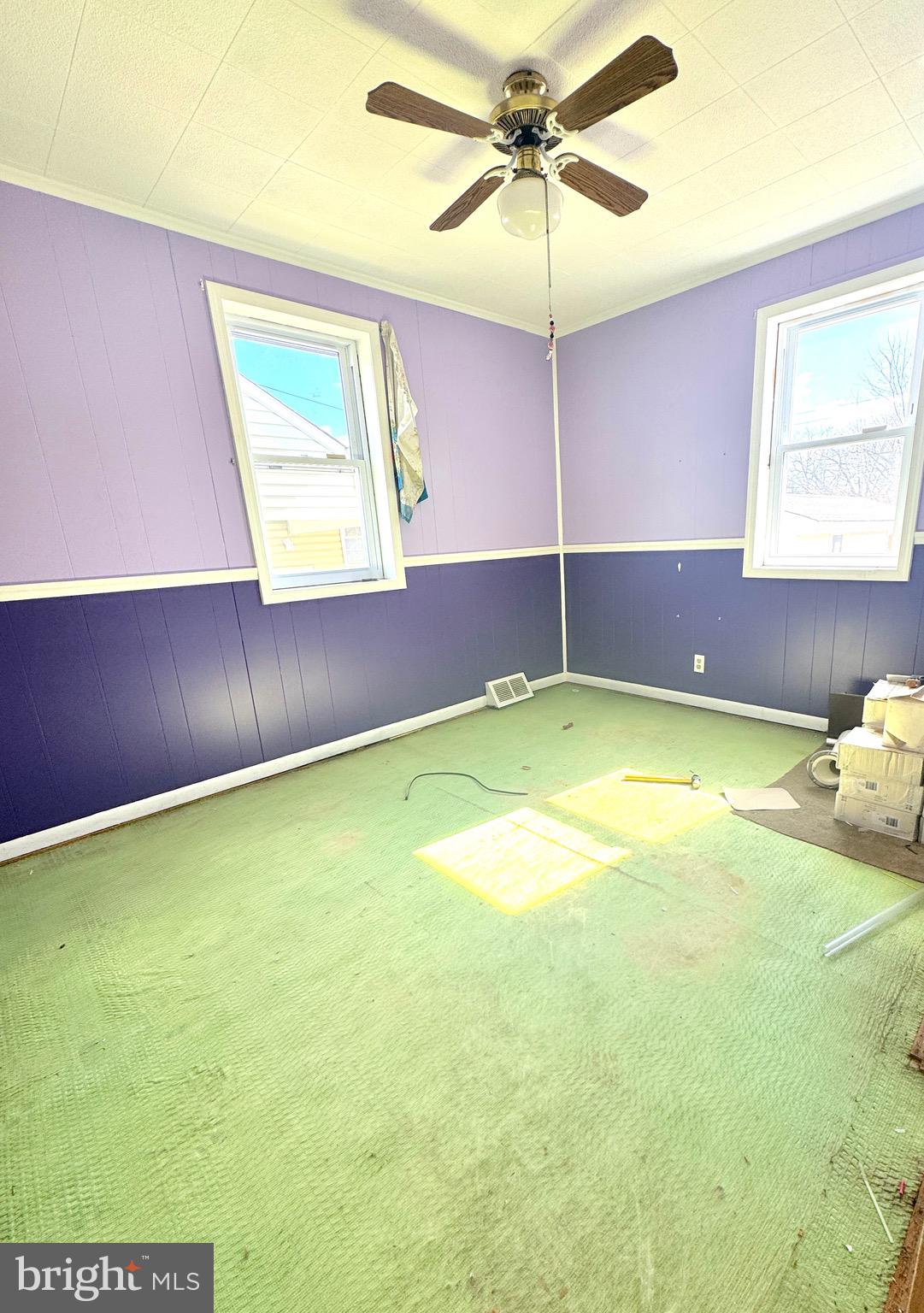 310 Pinewood Road Baltimore, MD 21222 - Photo 19 of 25 a view of an empty room with a window