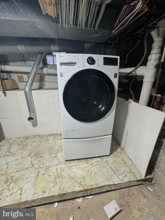 a utility room with a washer and dryer
