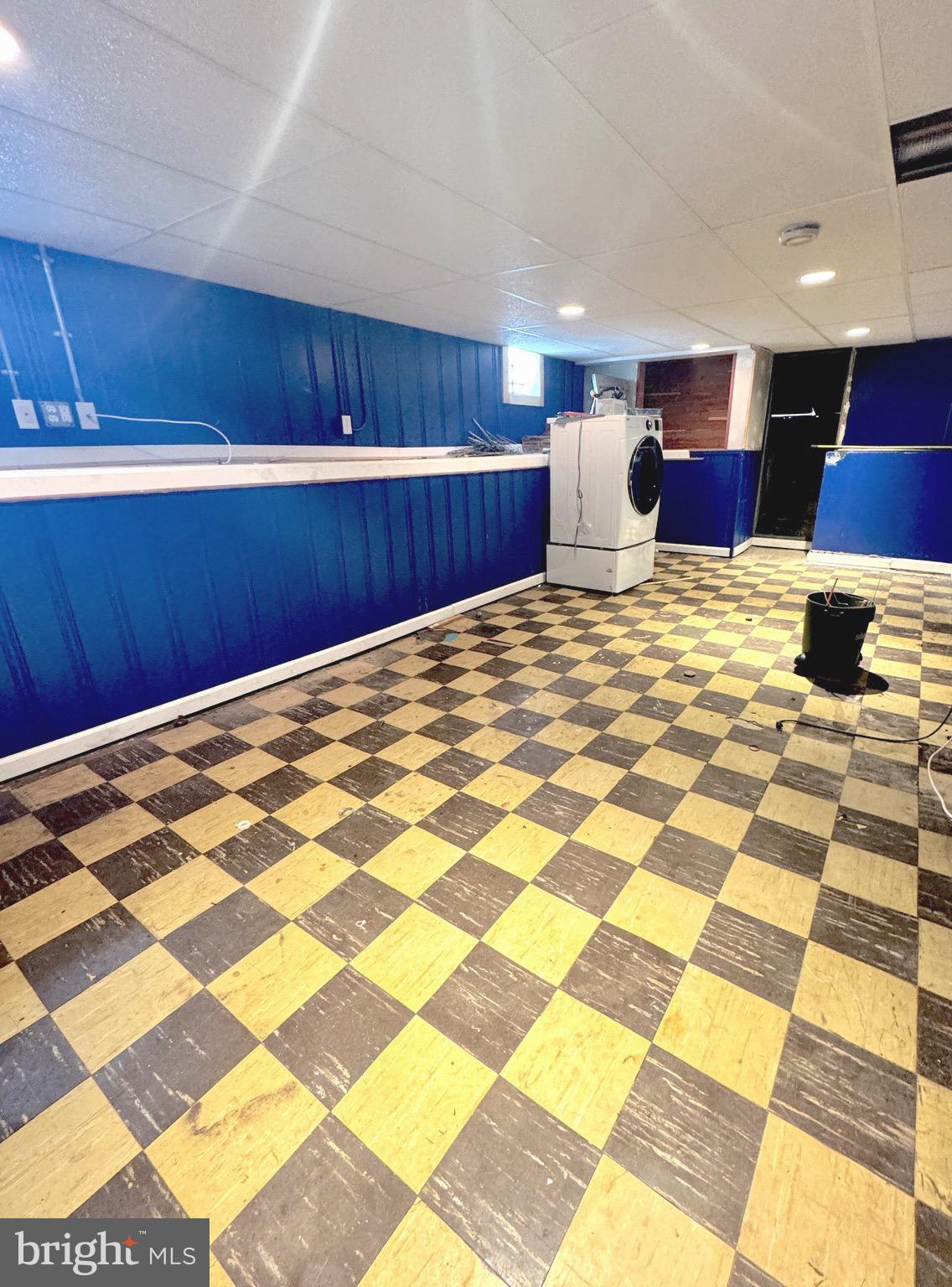 310 Pinewood Road Baltimore, MD 21222 - Photo 23 of 25 a view of kitchen with stainless steel appliances wooden cabinets and floor to ceiling window