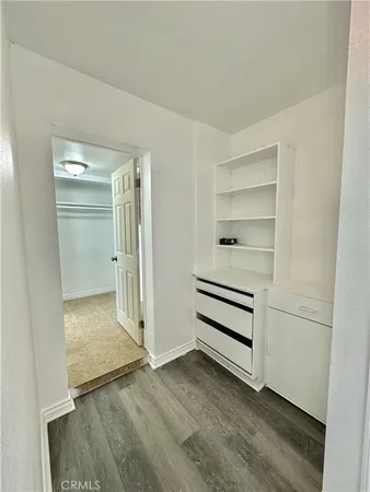 a view of an empty walk in closet