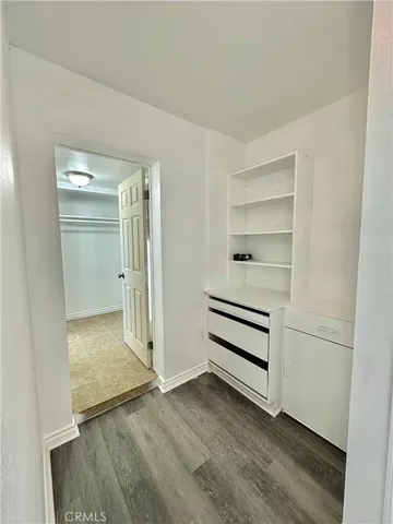 a view of an empty walk in closet