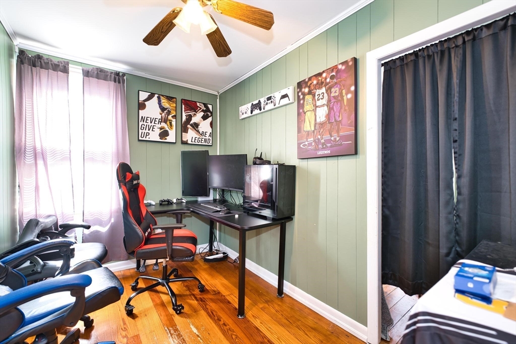 232 Alden Street Fall River, MA 02723 - Photo 14 of 34 a view of a workspace with furniture and a window