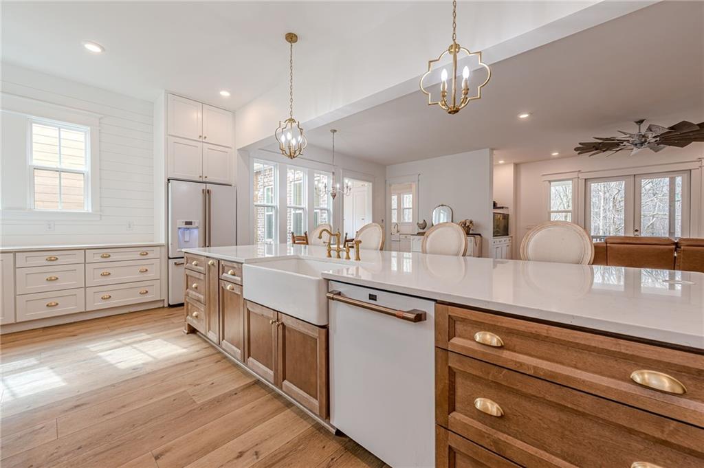 312 Ball Field Road Waleska, GA 30183 - Photo 15 of 73 a large kitchen with lots of counter space a sink appliances and cabinets