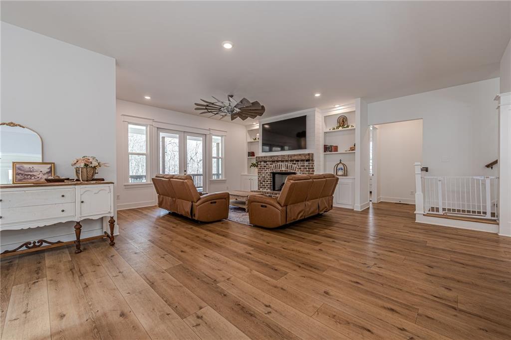 312 Ball Field Road Waleska, GA 30183 - Photo 18 of 73 a living room with furniture and a wooden floor