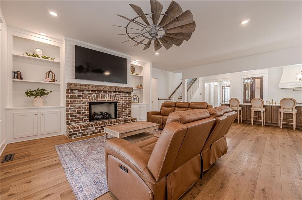 312 Ball Field Road Waleska, GA 30183 - Photo 21 of 73 a living room with furniture fireplace and flat screen tv