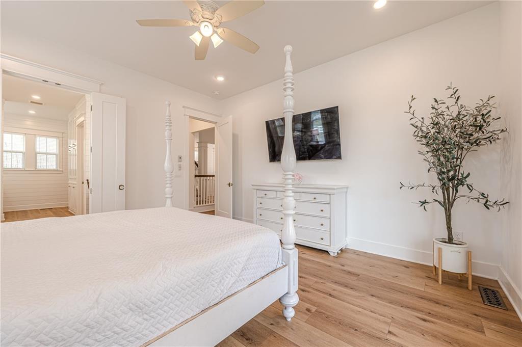 312 Ball Field Road Waleska, GA 30183 - Photo 29 of 73 a spacious bedroom with a bed and a flat screen tv