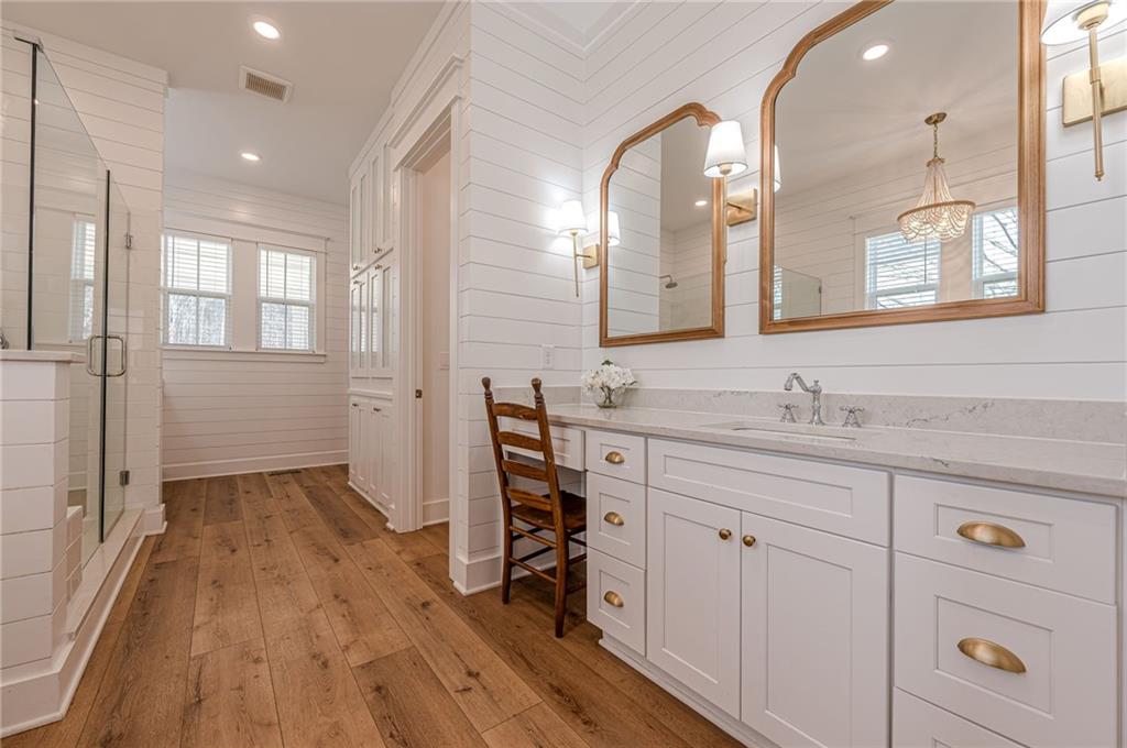 312 Ball Field Road Waleska, GA 30183 - Photo 30 of 73 a bathroom with a sink a mirror and a shower