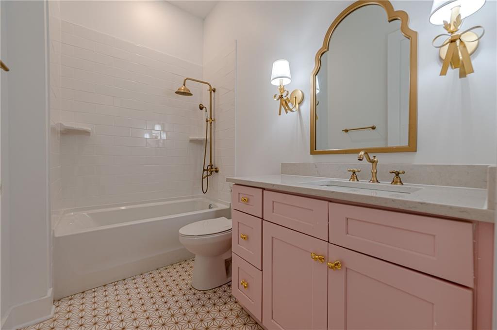 312 Ball Field Road Waleska, GA 30183 - Photo 40 of 73 a bathroom with a sink a toilet and a mirror