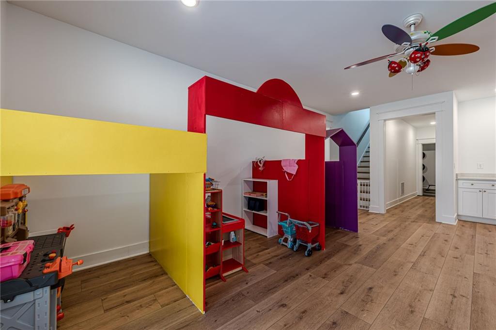 312 Ball Field Road Waleska, GA 30183 - Photo 42 of 73 a view of a room with wooden floor and gym equipment