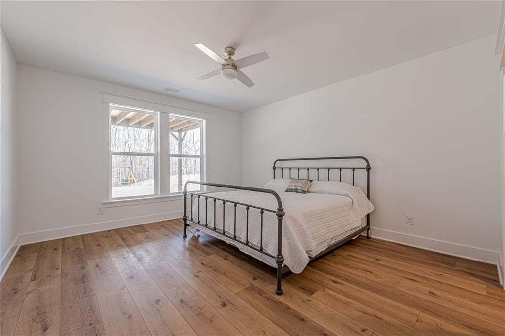 312 Ball Field Road Waleska, GA 30183 - Photo 50 of 73 a bedroom with a bed and window