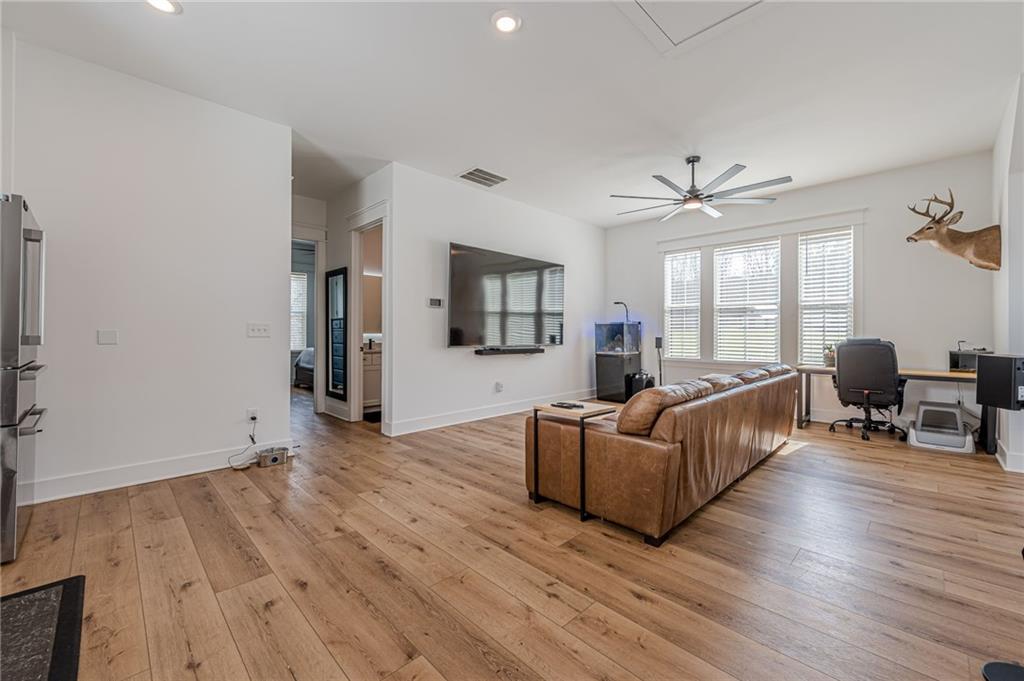 312 Ball Field Road Waleska, GA 30183 - Photo 55 of 73 a living room with furniture and a wooden floor