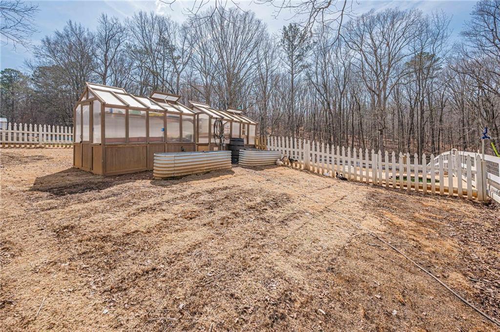 312 Ball Field Road Waleska, GA 30183 - Photo 71 of 73 a view of a yard with wooden fence
