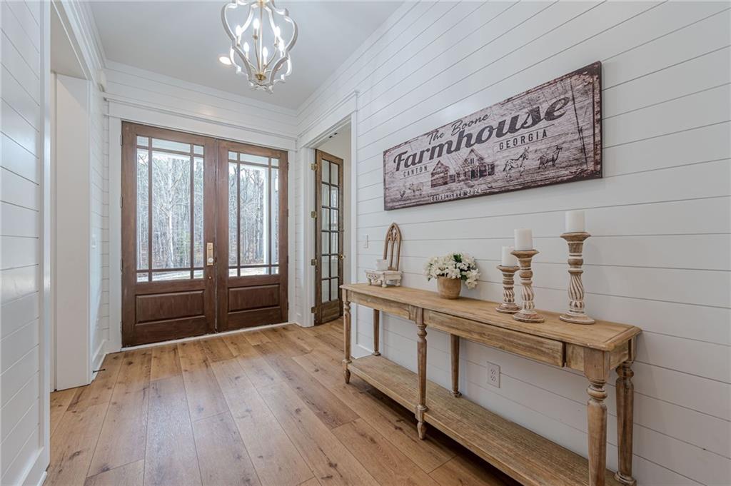 312 Ball Field Road Waleska, GA 30183 - Photo 9 of 73 a kitchen that has a lot of cabinets a sink and wooden floor