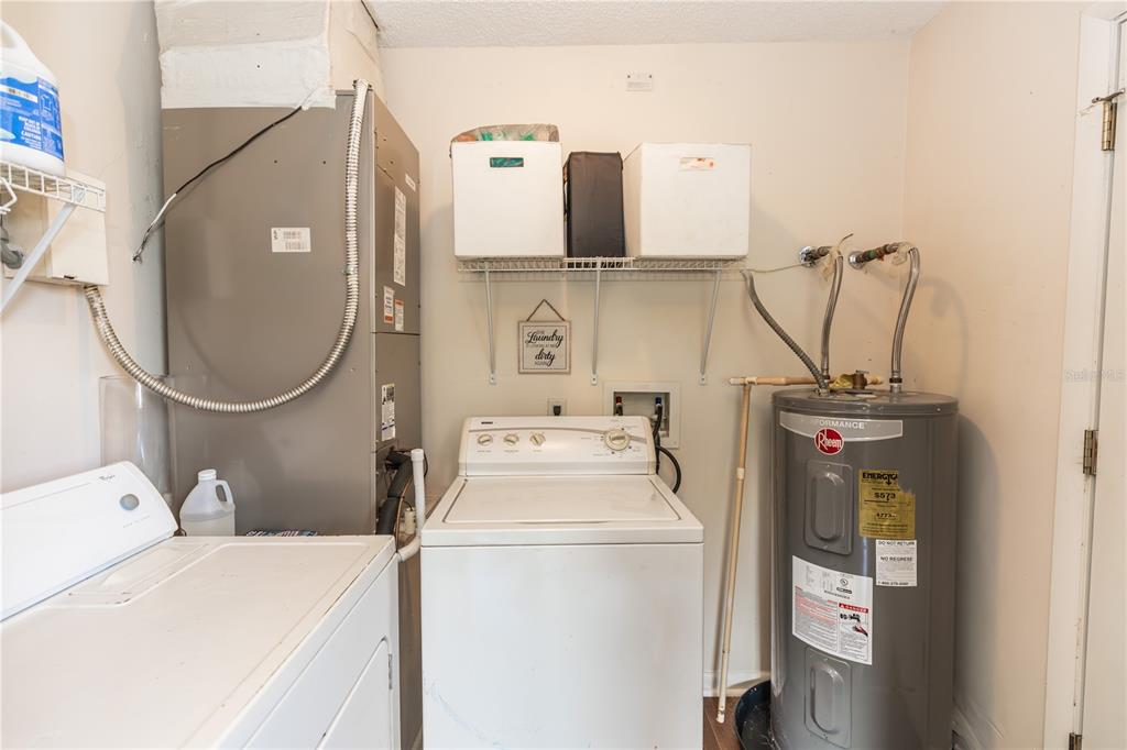 1230 8th Avenue DeLand, FL 32724 - Photo 11 of 25 a utility room with dryer and washer
