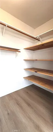 a view of small space with racks on the wall