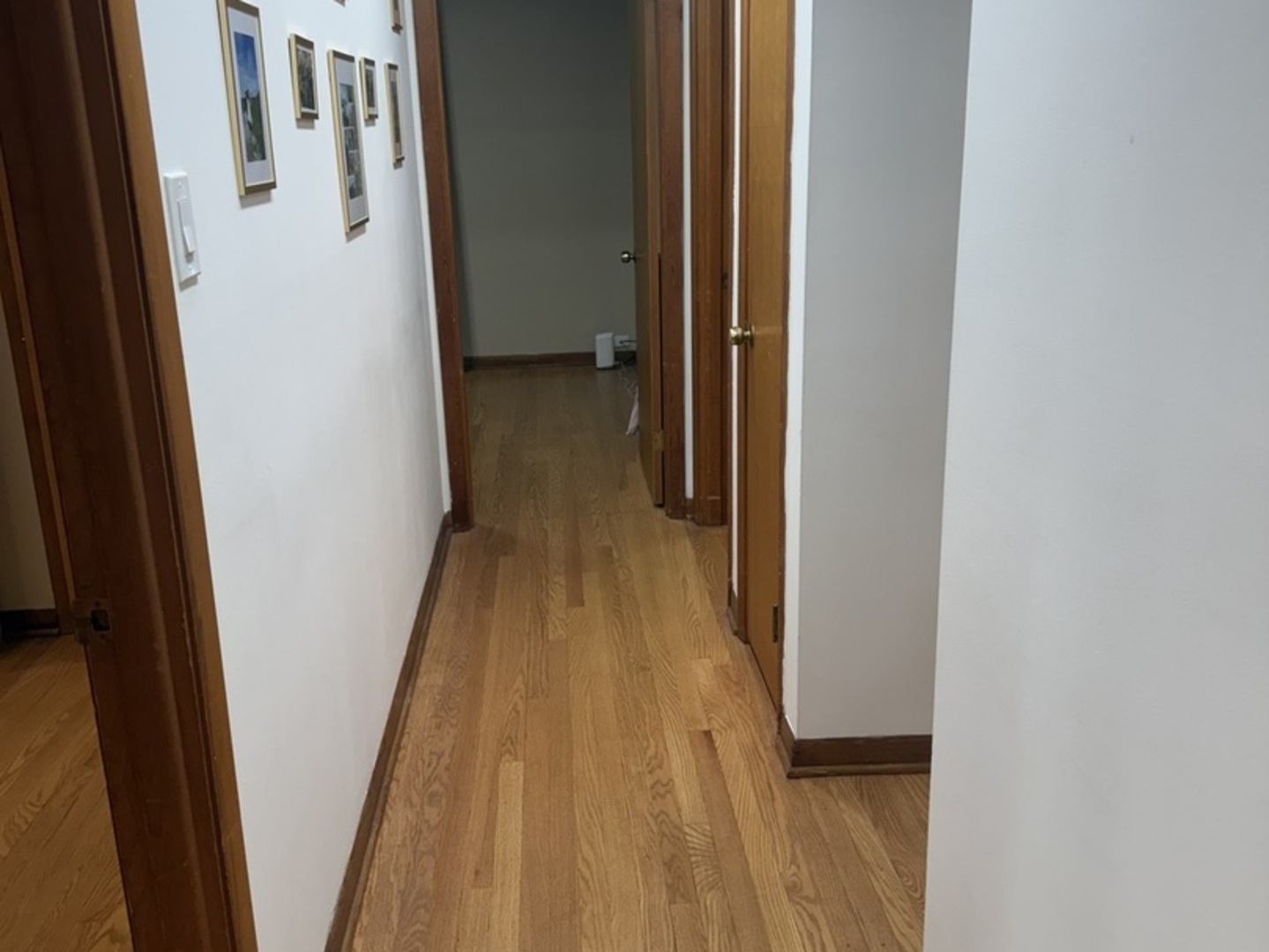 3763 153rd Street Midlothian, IL 60445 - Photo 9 of 17 a view of a hallway with wooden floor and staircase