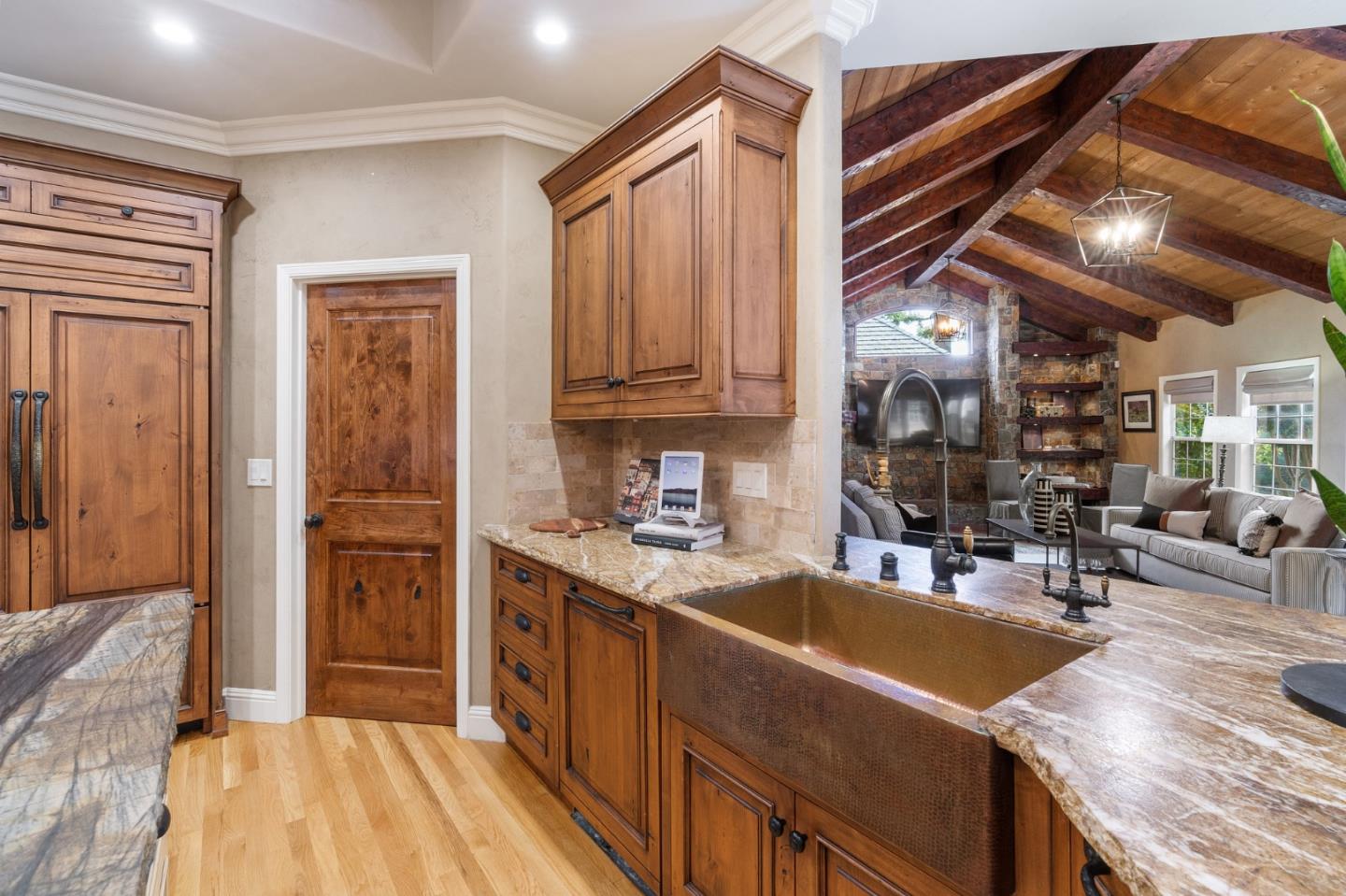 2395 Ric Drive Gilroy, CA 95020 - Photo 27 of 100 a kitchen with granite countertop a sink and wooden cabinets