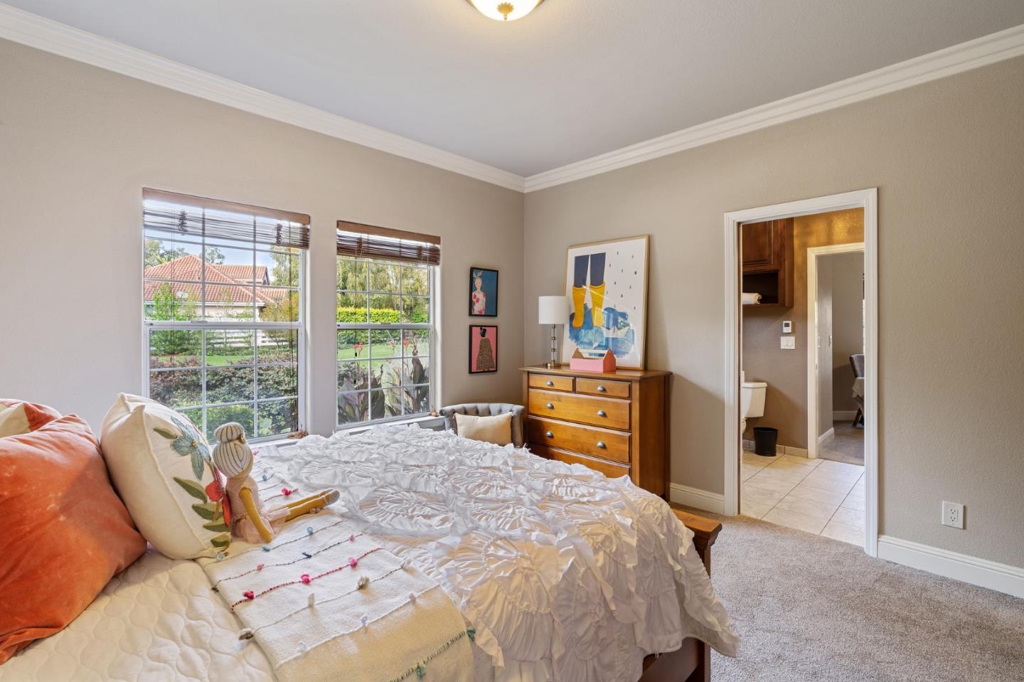 2395 Ric Drive Gilroy, CA 95020 - Photo 63 of 100 a bed sitting in a bedroom next to a window