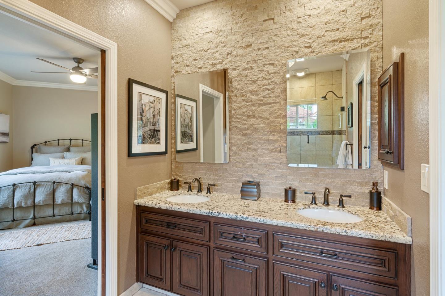 2395 Ric Drive Gilroy, CA 95020 - Photo 64 of 100 a en suite bathroom with a granite countertop double vanity sink and mirror