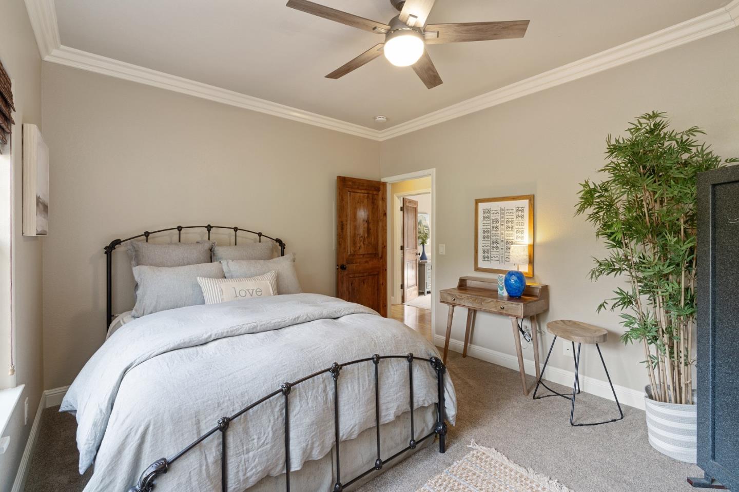 2395 Ric Drive Gilroy, CA 95020 - Photo 66 of 100 a bedroom with a bed and a chandelier