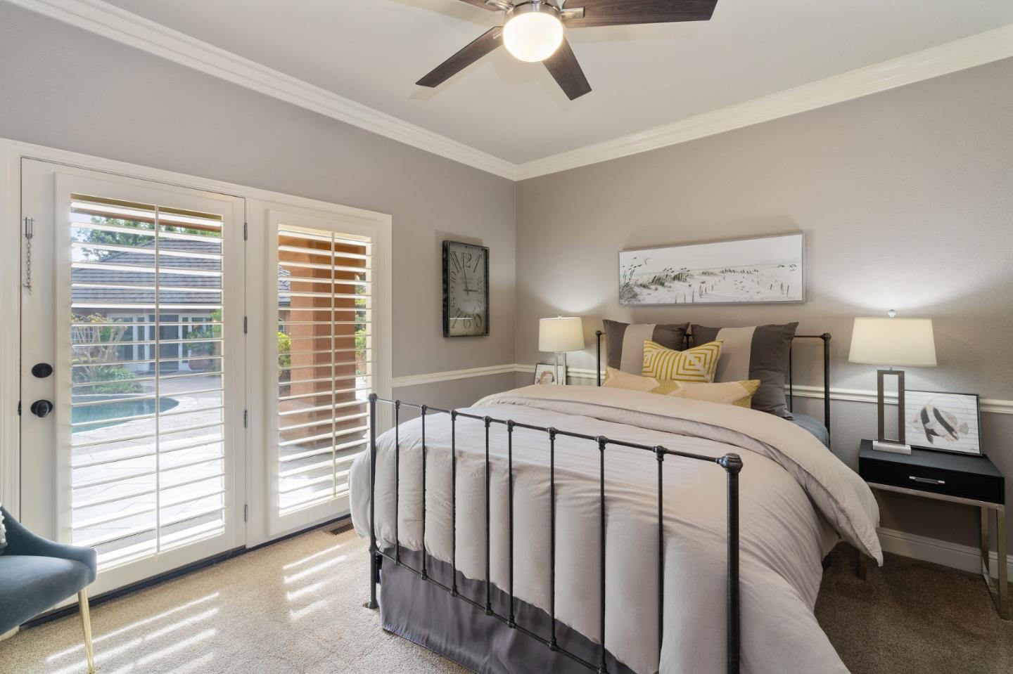 2395 Ric Drive Gilroy, CA 95020 - Photo 68 of 100 a bedroom with a large bed and a chandelier