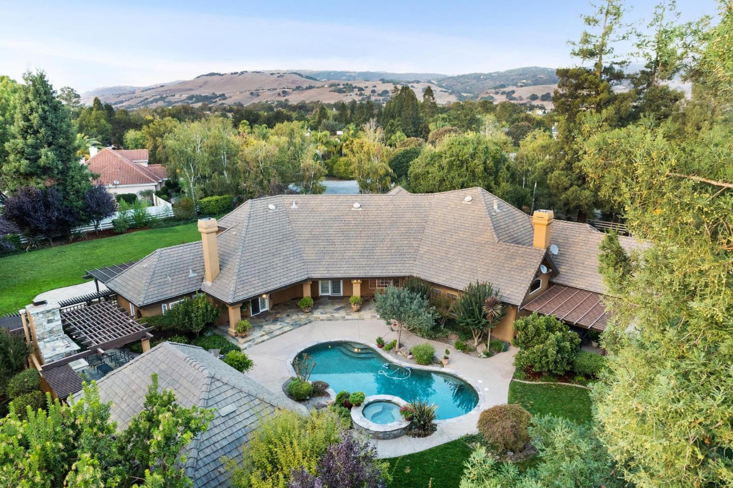 2395 Ric Drive Gilroy, CA 95020 - Photo 9 of 100 an aerial view of a house with a garden