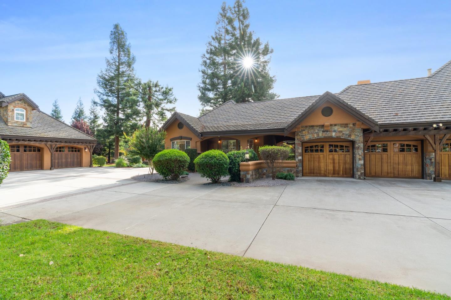 2395 Ric Drive Gilroy, CA 95020 - Photo 98 of 100 a front view of a house with a garden and plants