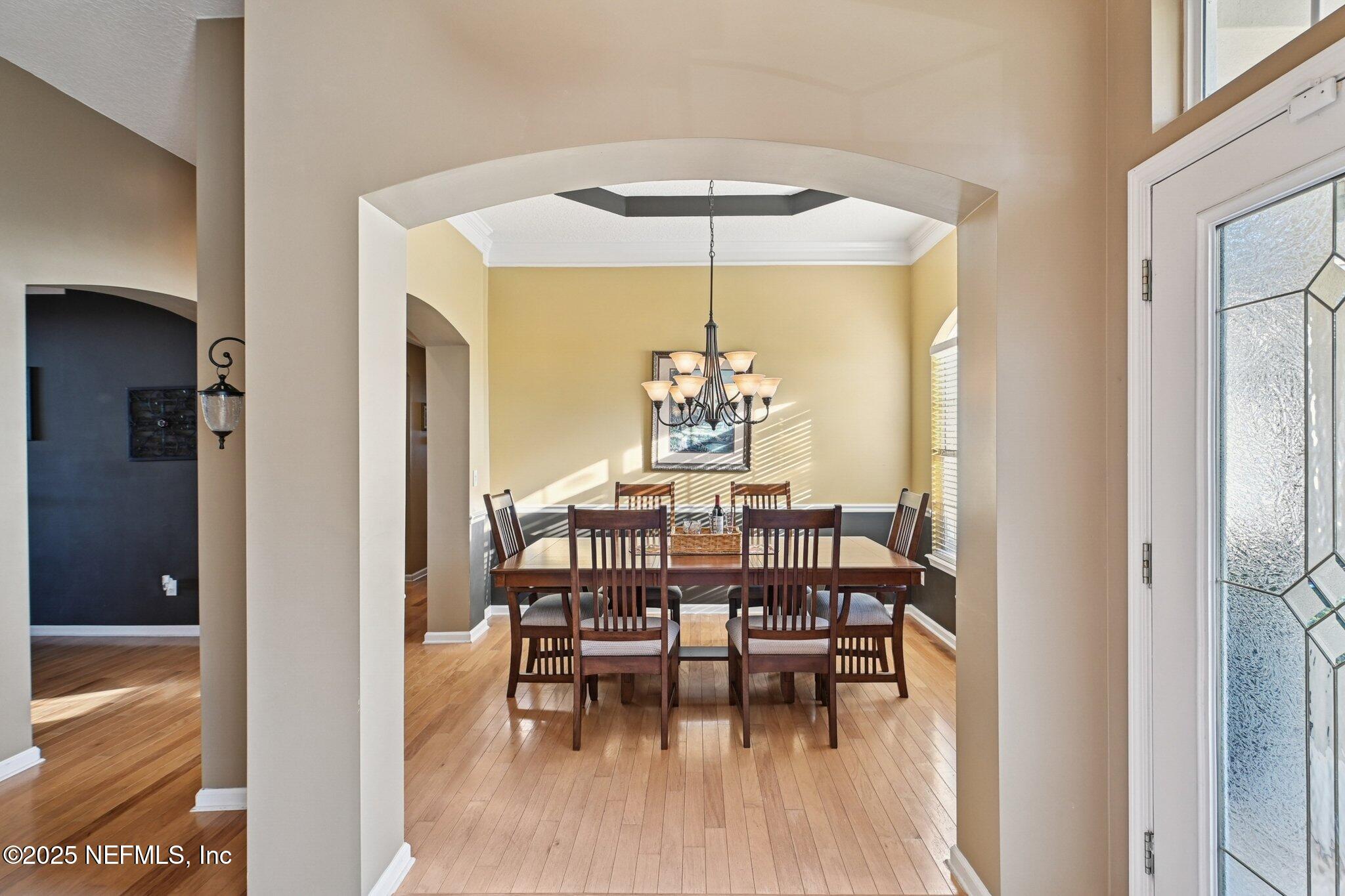 1862 Sentry Oak Court Fleming Island, FL 32003 - Photo 30 of 83 a dining room with furniture and window