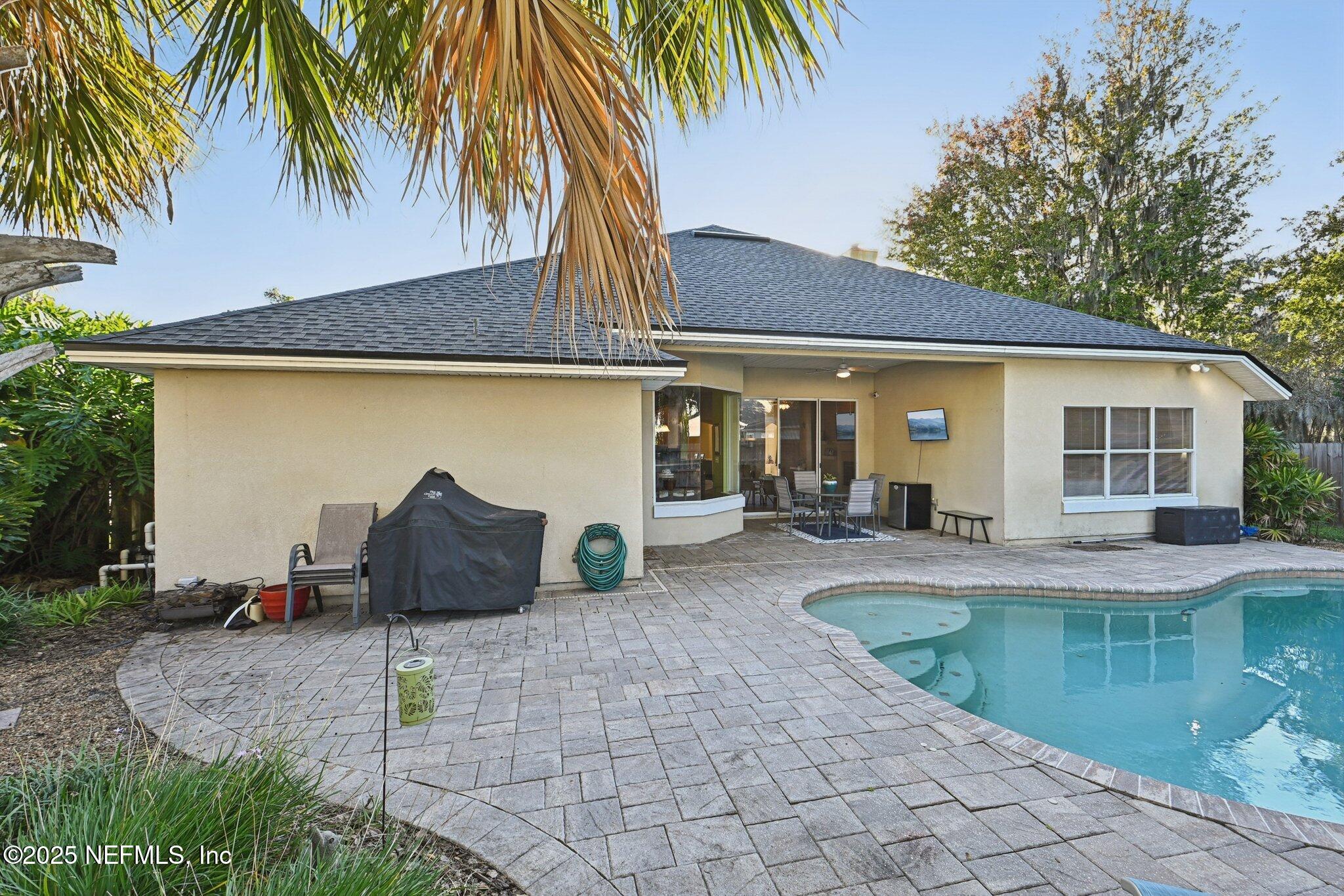1862 Sentry Oak Court Fleming Island, FL 32003 - Photo 46 of 83 a front view of house with yard and seating space