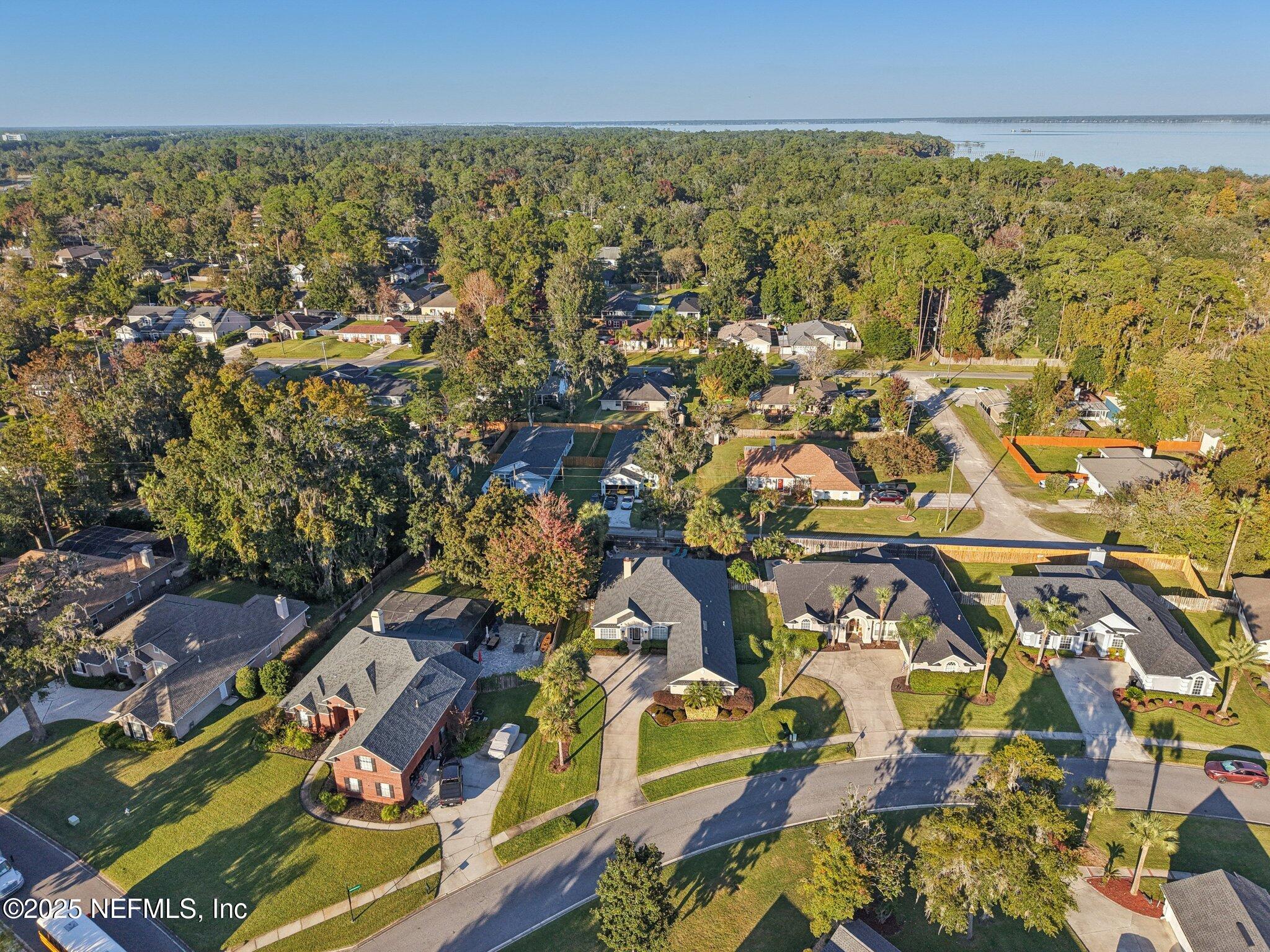 1862 Sentry Oak Court Fleming Island, FL 32003 - Photo 57 of 83 an aerial view of residential building and car parked