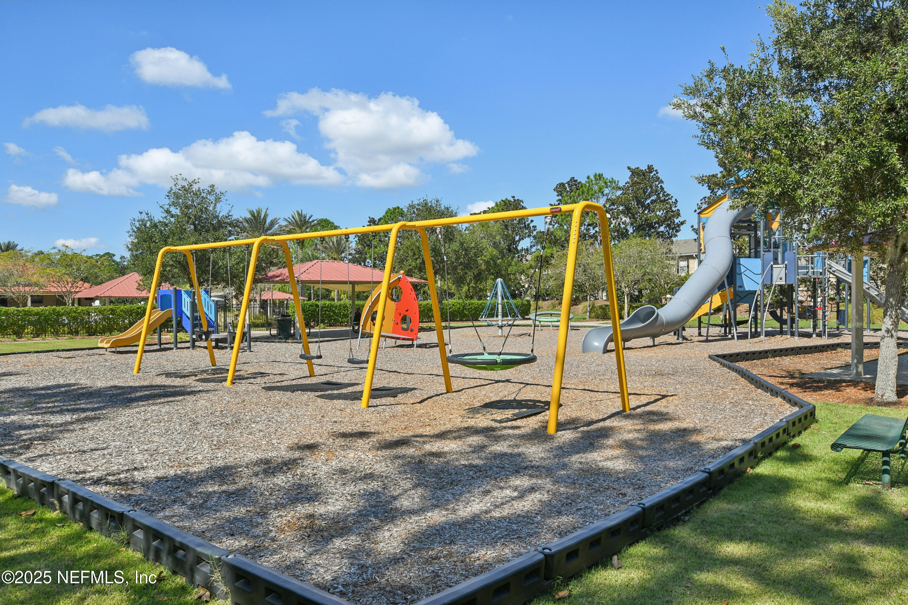 1862 Sentry Oak Court Fleming Island, FL 32003 - Photo 68 of 83 a view of a park with swings