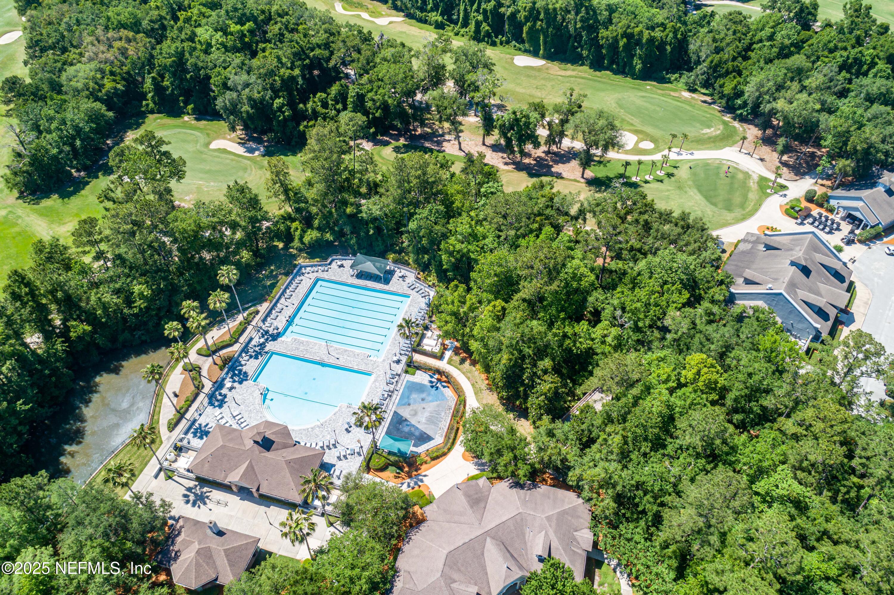 1862 Sentry Oak Court Fleming Island, FL 32003 - Photo 77 of 83 an aerial view of residential house with outdoor space and trees all around