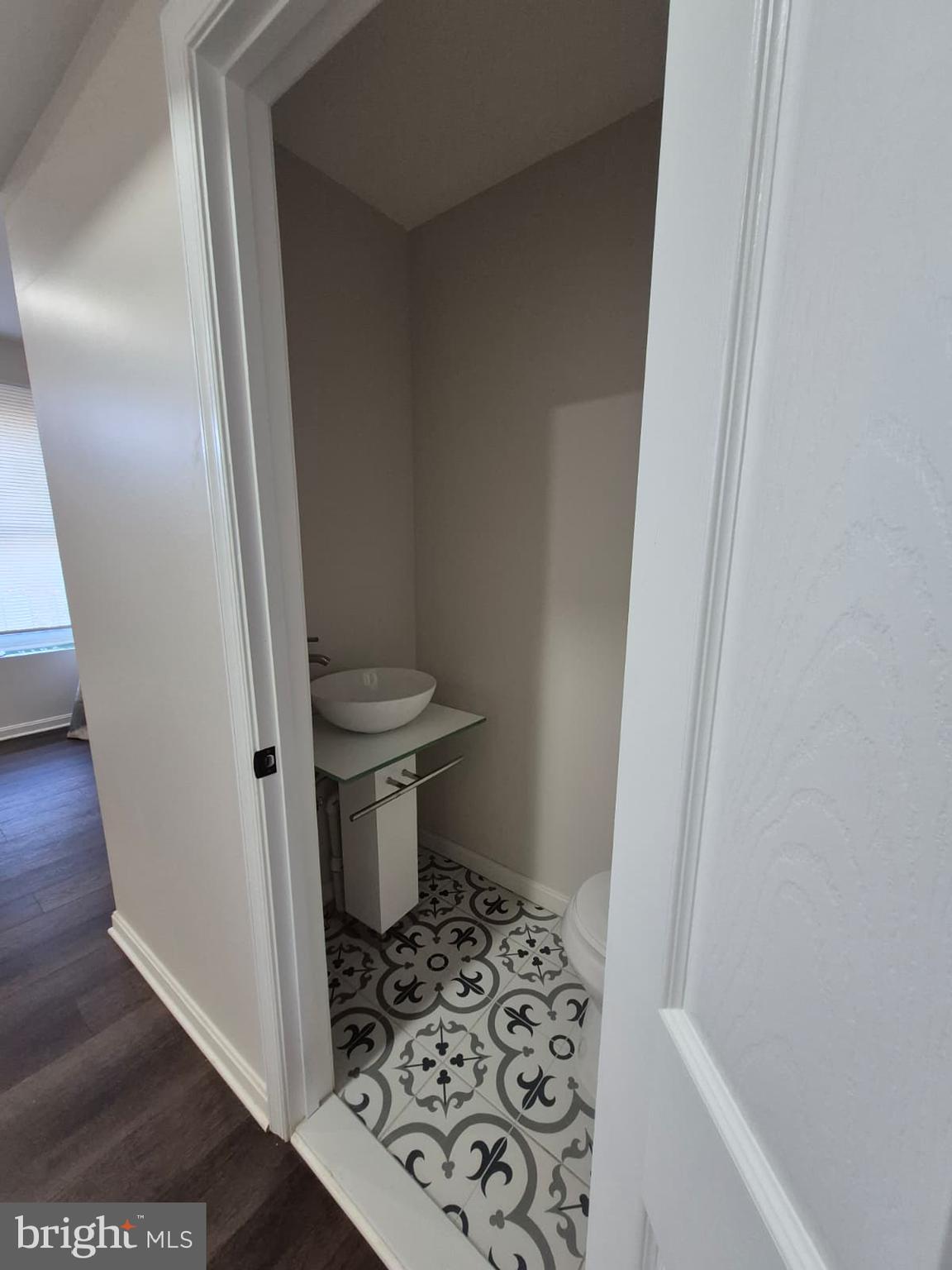 2015 East Fairmount Avenue Baltimore, MD 21231 - Photo 5 of 27 a bathroom with a toilet and a shower