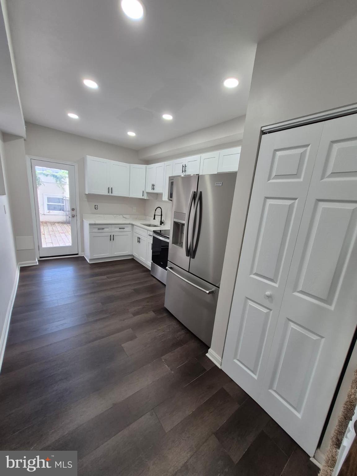 2015 East Fairmount Avenue Baltimore, MD 21231 - Photo 6 of 27 a view of kitchen with furniture and wooden floor