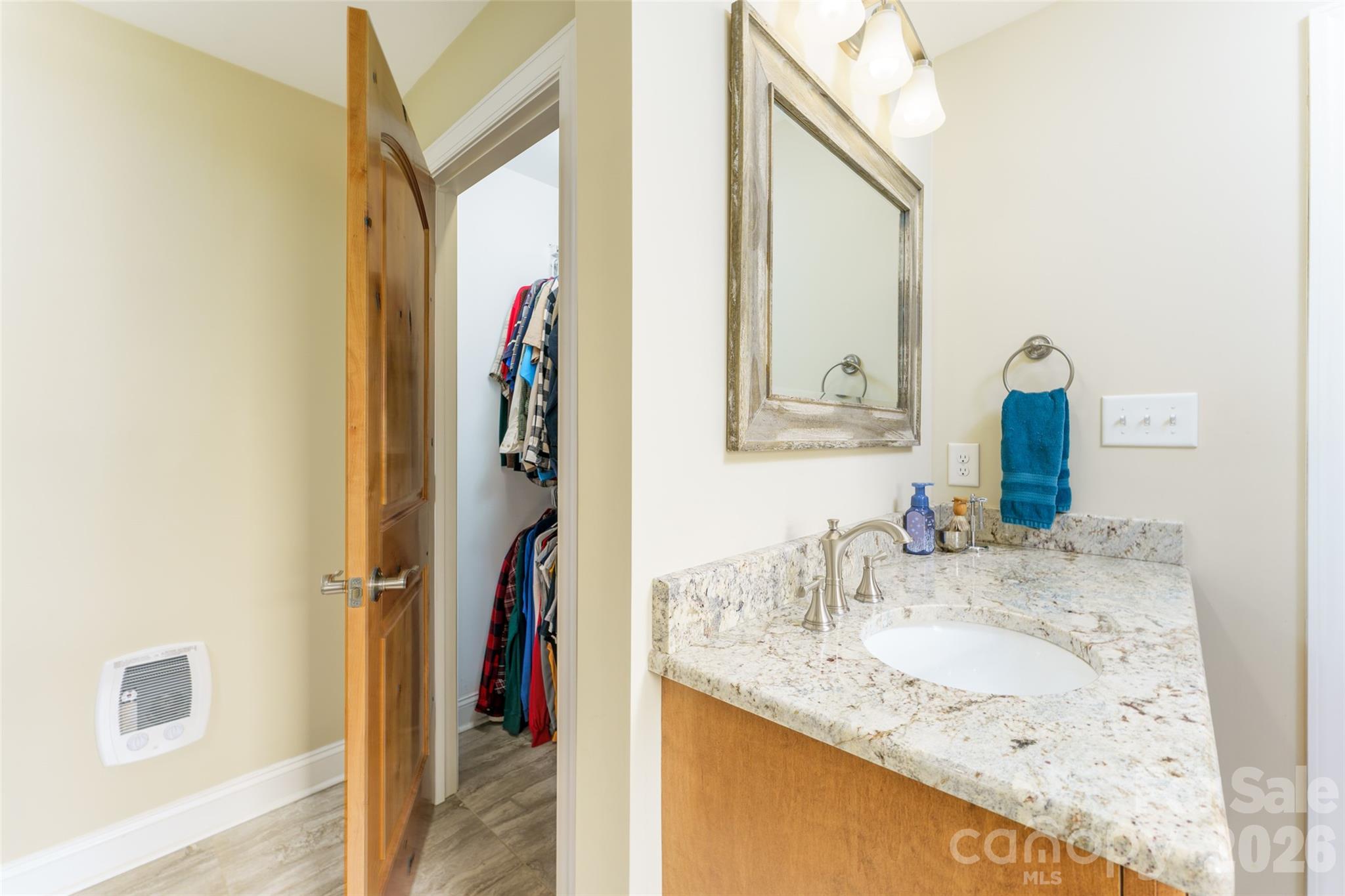 8194 Mallard Road Denver, NC 28037 - Photo 15 of 48 a en suite bathroom with a granite countertop sink and a mirror