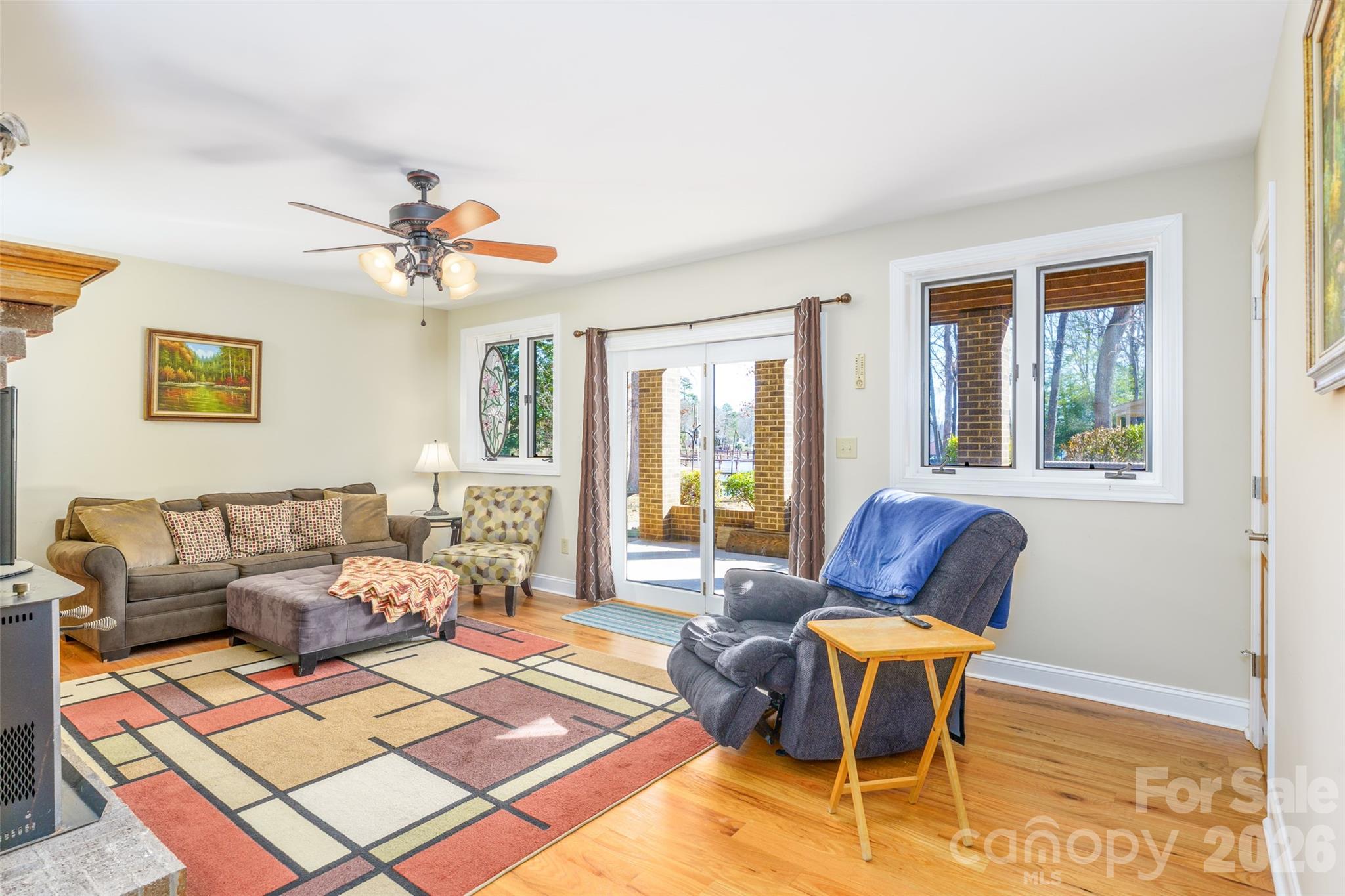 8194 Mallard Road Denver, NC 28037 - Photo 24 of 48 a living room with furniture and a window