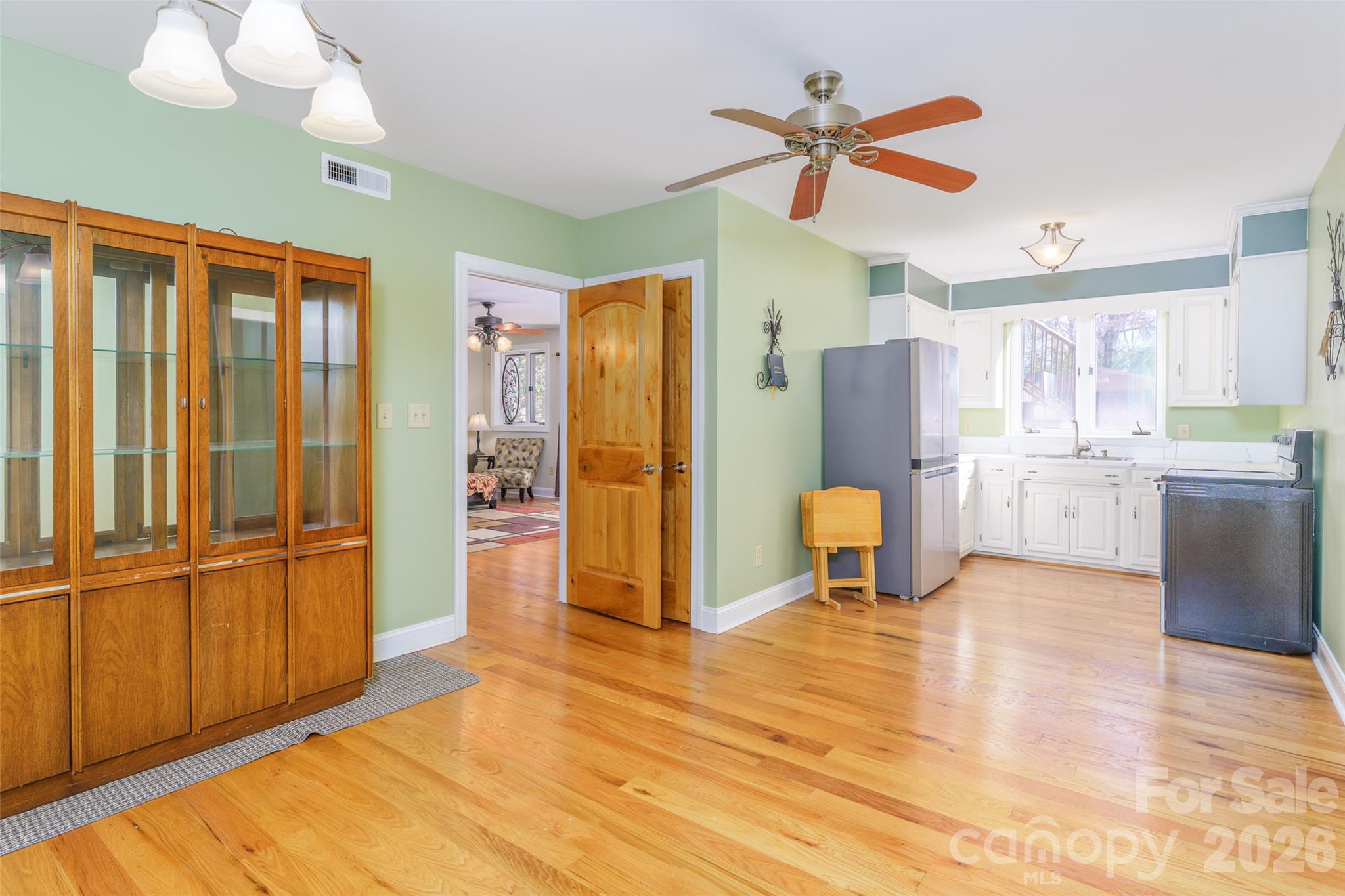 8194 Mallard Road Denver, NC 28037 - Photo 26 of 48 a view of kitchen with furniture and a ceiling fan