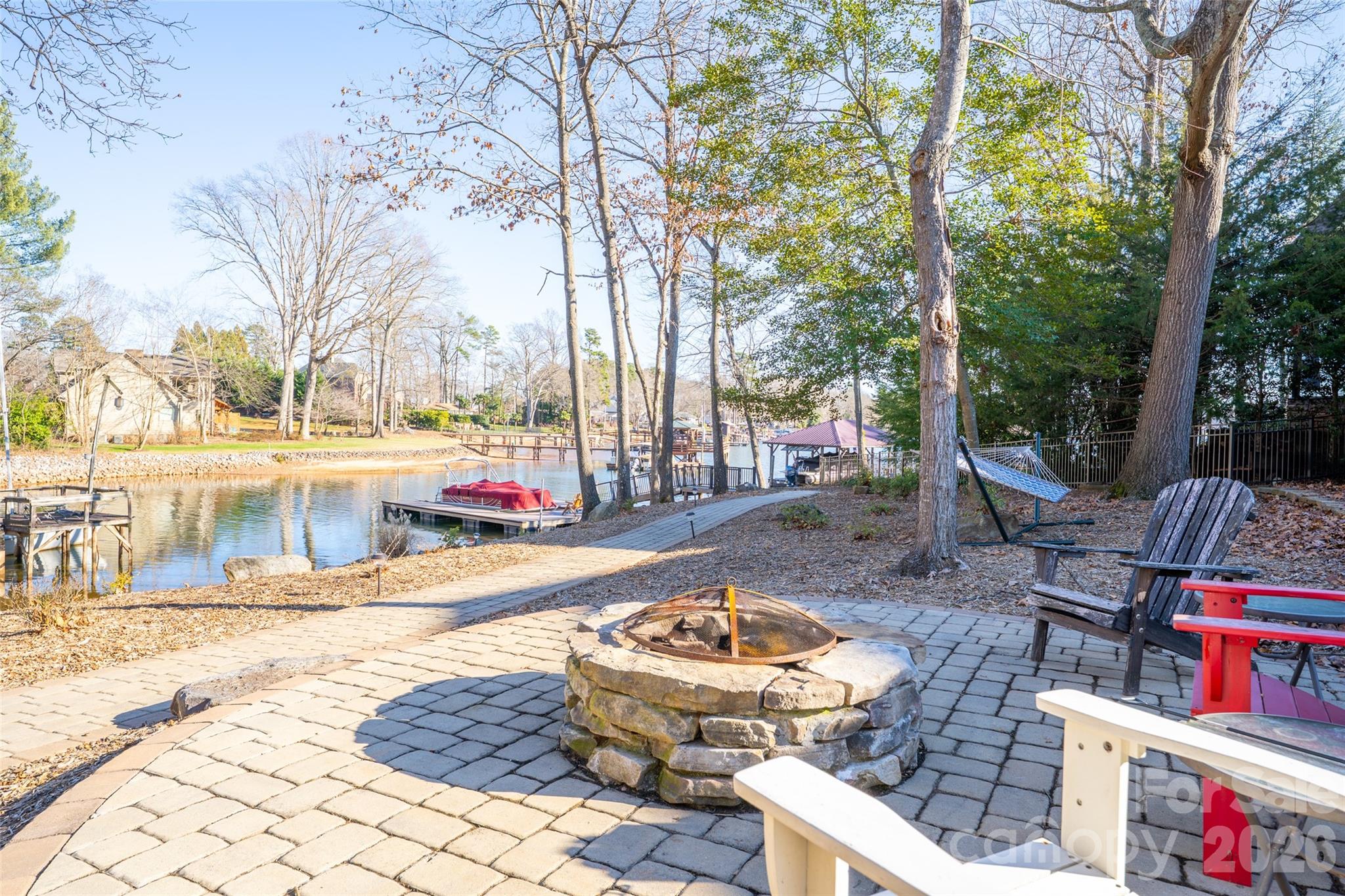 8194 Mallard Road Denver, NC 28037 - Photo 40 of 48 a view of a patio with swimming pool table and chairs