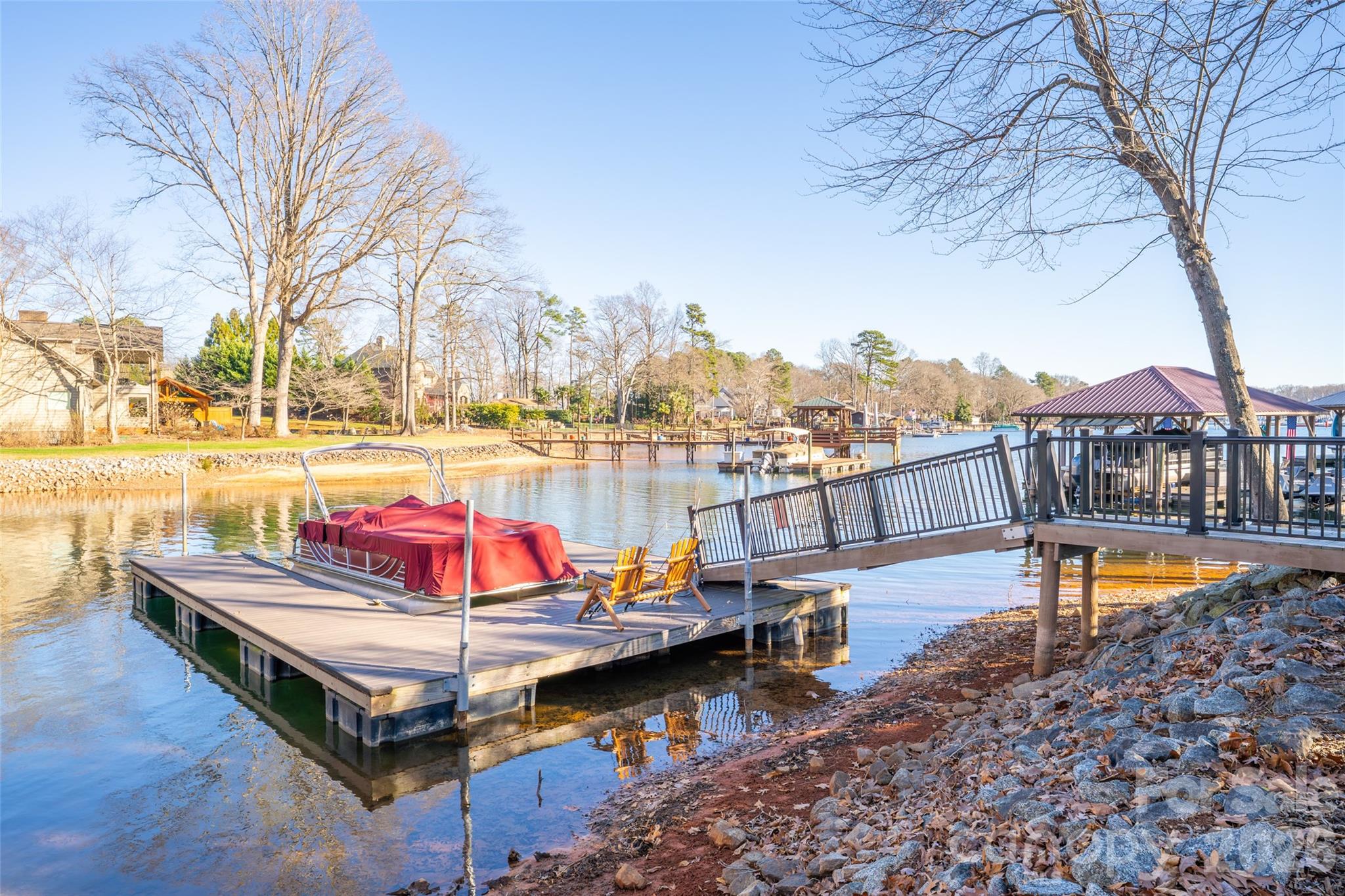 8194 Mallard Road Denver, NC 28037 - Photo 42 of 48 a view of a swimming pool with lounge chairs