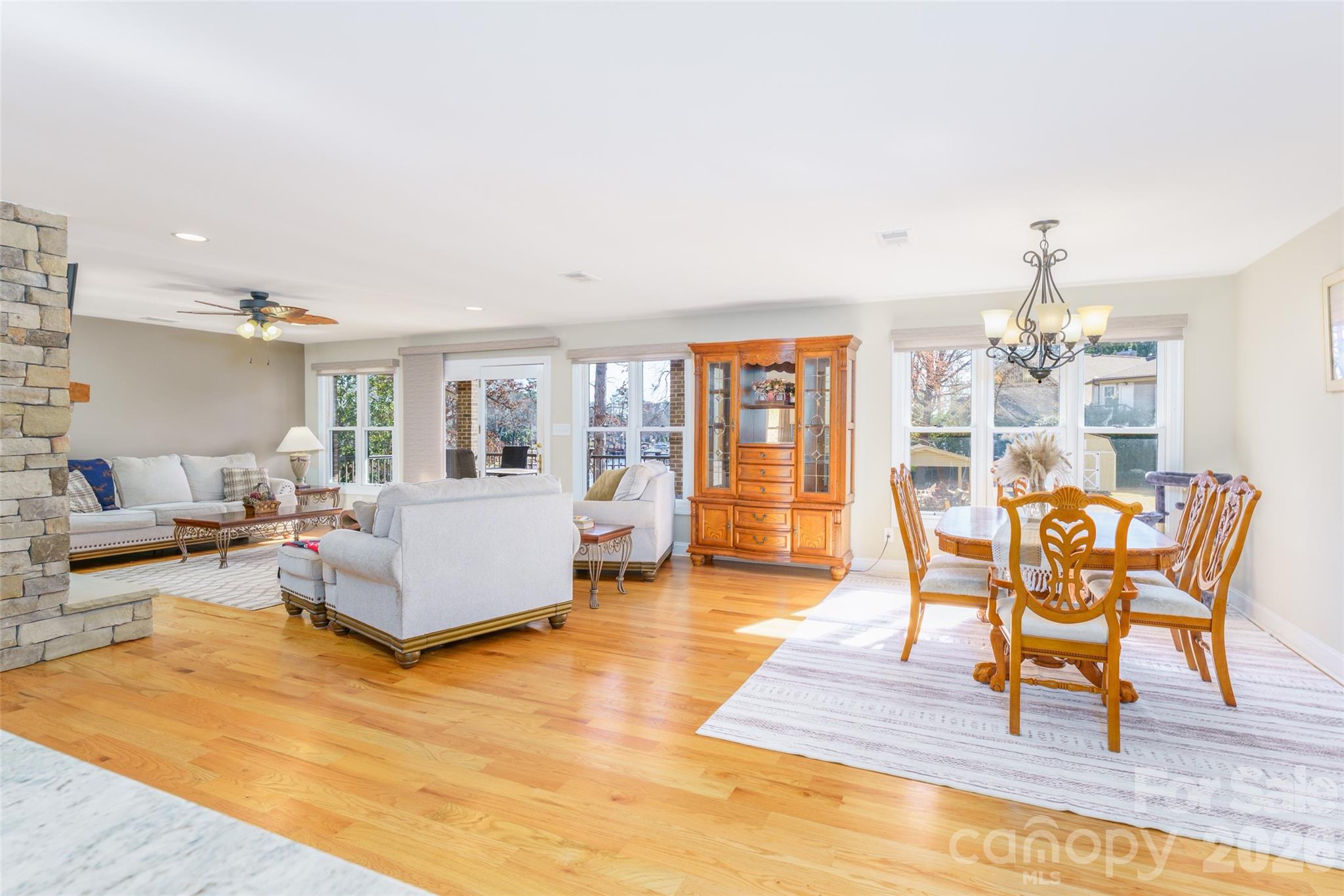 8194 Mallard Road Denver, NC 28037 - Photo 7 of 48 a living room with furniture and a dining table