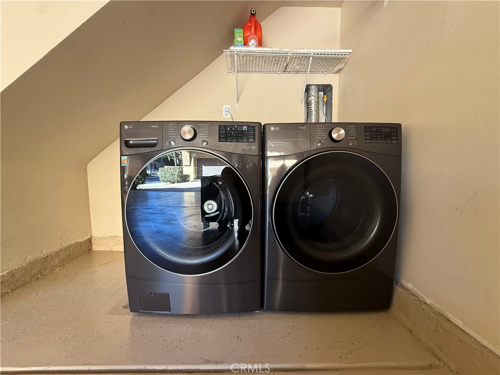 44965 Blue Rosemary Way Temecula, CA 92592 - Photo 19 of 25 a utility room with dryer and washer