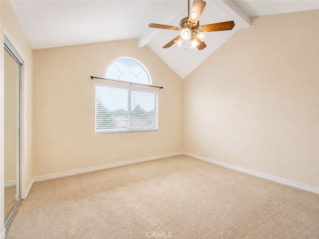 2811 North Roxbury Street Orange, CA 92867 - Photo 14 of 22 an empty room with a window and a fan