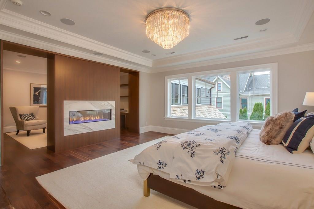 9 Franklin Road Lexington, MA 02420 - Photo 7 of 12 a bed sitting in a spacious bedroom next to a window