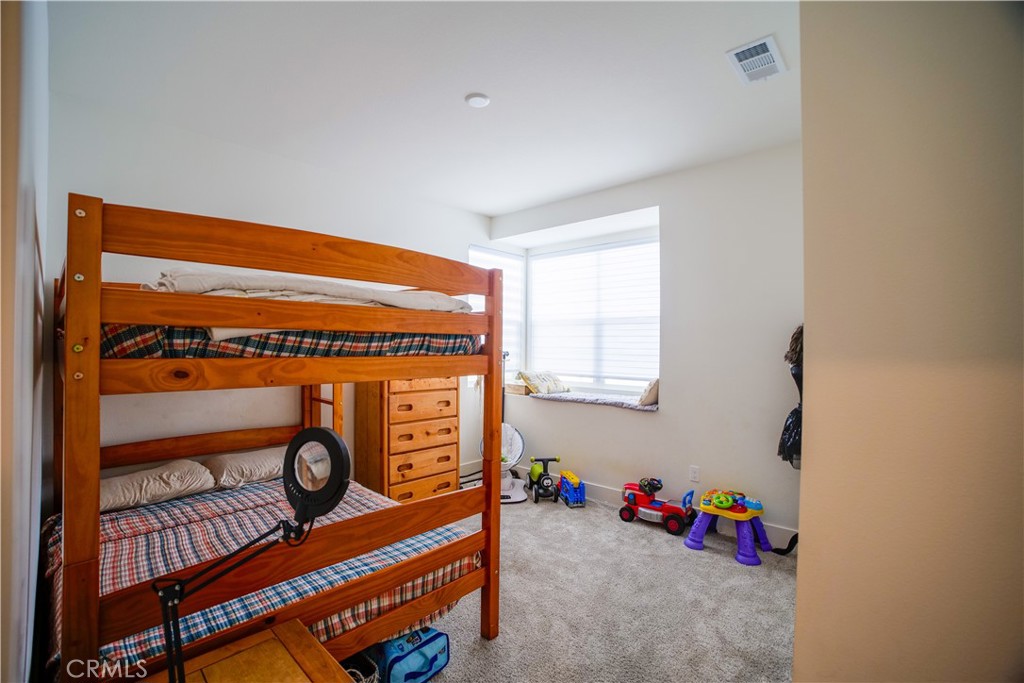 35323 Orchard Trail Fallbrook, CA 92028 - Photo 21 of 30 a room with furniture and a window