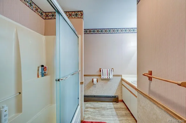 a bed room with a bed and a chandelier